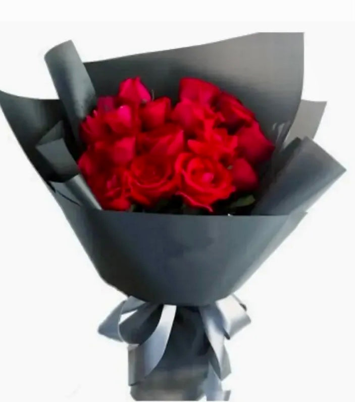 One dozen red roses gift wrapped