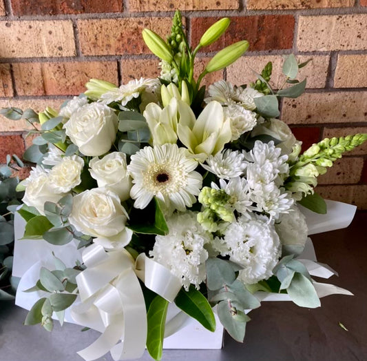 Florist choice white box arrangement